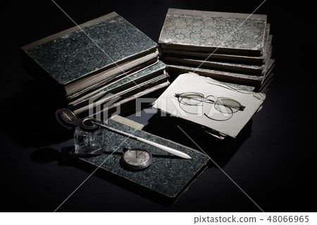 Old books, papers, ink pen and inkpot Old books, papers, ink pen and inkpot 48066965
