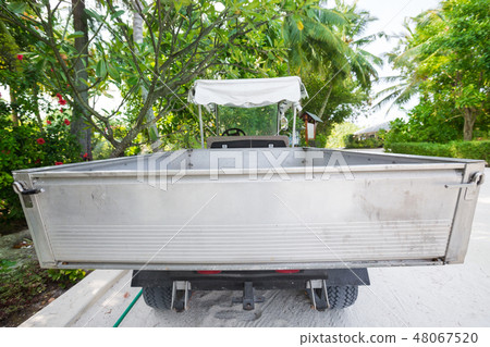 Electro truck on tropical road 48067520