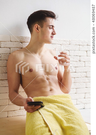 morning routine, awakening, fit man drinking water 48069487