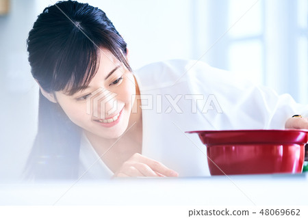 Woman cooking 48069662