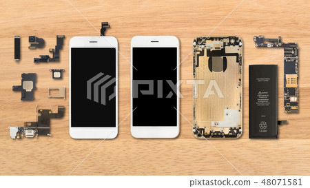 Smartphone components on wooden background 48071581