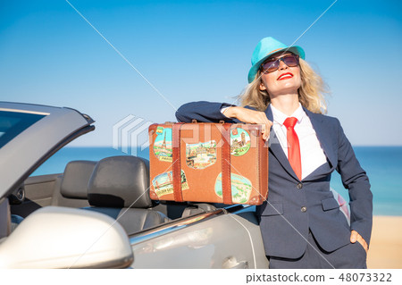 Successful young businesswoman on a beach 48073322