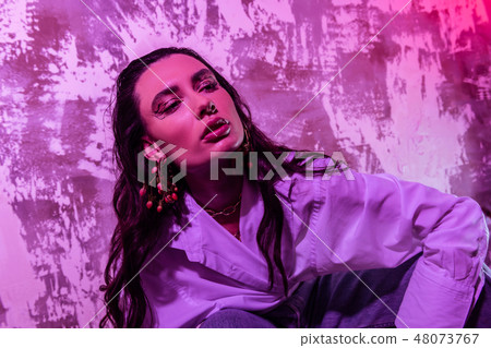 Portrait of a dreamy creative young woman 48073767