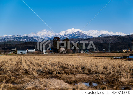 Rural and Tateyama mountain ranges in Toyama Tateyama Town Winter 2019.02 48073828