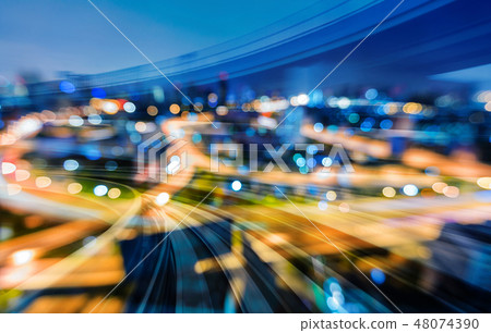 Train motion track over blur bokeh city light Train motion track over blur bokeh city light 48074390