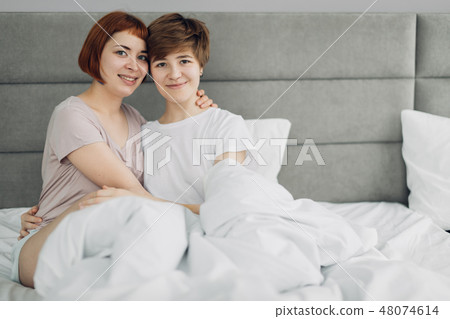 best friends posing to the camera 48074614