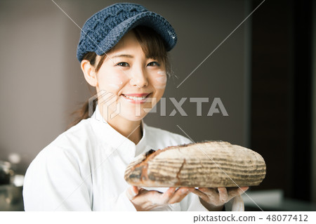 Baker's food working woman Baker's food working woman 48077412