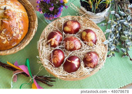 Easter eggs dyed with onion peels Easter eggs dyed with onion peels 48078678