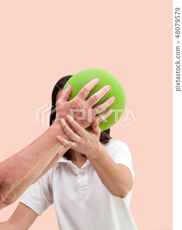 Senior patient and physiotherapist 48079579
