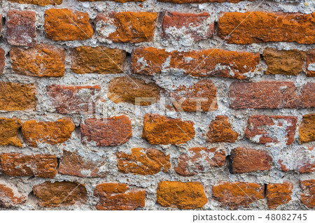 Background of an old stone brick wall shot close-u 48082745