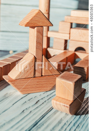 Children's wooden designer from blocks of a different form 48085863