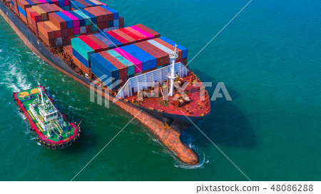 Container ship arriving in port, Tug boat 48086288