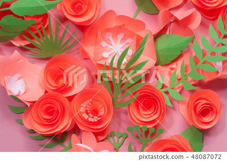 Different pink paper flowers on pink background 48087072