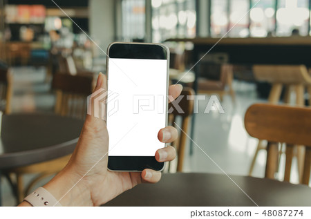 Woman with mobile phone 48087274
