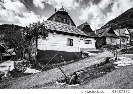 Colorful wooden houses in Vlkolinec, colorless 48087872