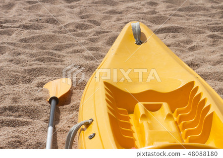 Kayaking on sea. Kayak and oar on sandy beach. Kayaking on sea. Kayak and oar on sandy beach. 48088180