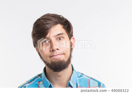 Process, problem, people concept - young man thinking about something on white background Process, problem, people concept - young man thinking about something on white background 48088322