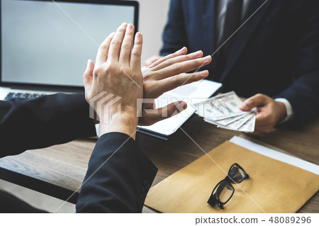 Anti bribery and corruption concept, Business man refusing and d Anti bribery and corruption concept, Business man refusing and d 48089296