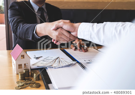 Image of successful deal of real estate, Broker and client shaki 48089301