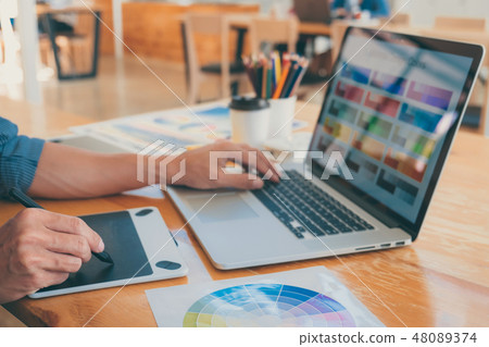 Young creative graphic designer working on project architectural Young creative graphic designer working on project architectural 48089374