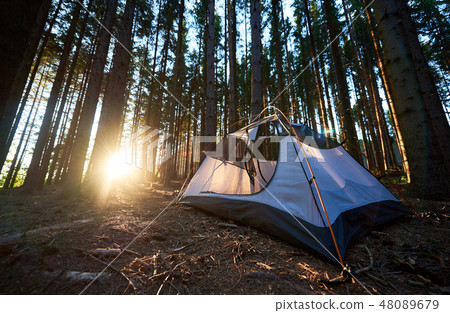 Tourist tent at campsite in the evening. Summer camping Tourist tent at campsite in the evening. Summer camping 48089679