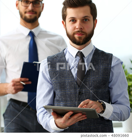 Group of smiling bearded clerk men at workplace 48091660