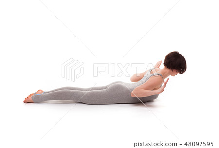 young beautiful woman yoga posing. isolated young beautiful woman yoga posing. isolated 48092595