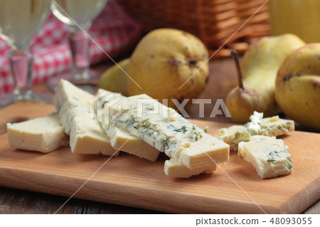 Blue cheese, pears, and wine 48093055
