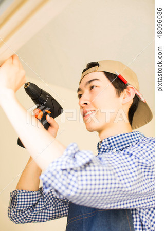 Men enjoying DIY Men enjoying DIY 48096086