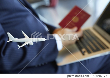 A businessman of a business trip abroad who works at the airport 48096174