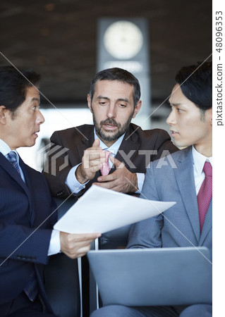 A businessman of a business trip abroad who works at the airport A businessman of a business trip abroad who works at the airport 48096353