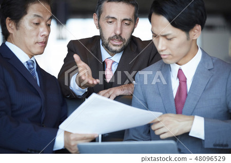 A businessman of a business trip abroad who works at the airport A businessman of a business trip abroad who works at the airport 48096529