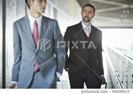 A businessman at a business trip abroad A businessman at a business trip abroad 48096635