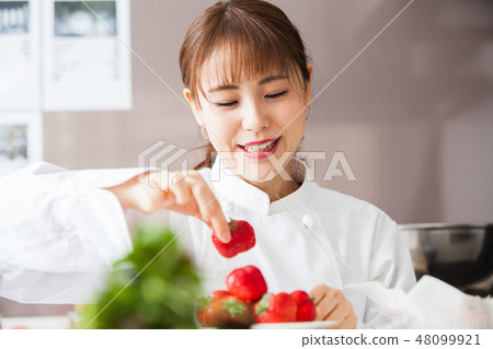 Cooking woman cooking chef 48099921