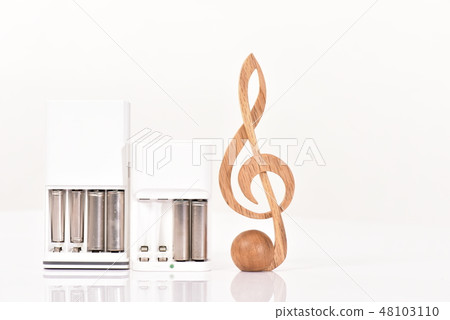 Treble clef and battery and charger 48103110