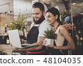 Portrait of smiling florists man and woman 48104035