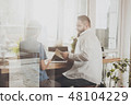 A man discusses work affairs with a girl 48104229