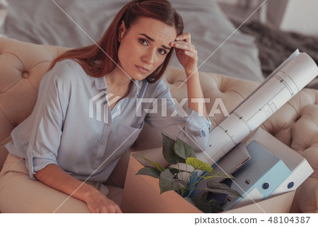 Cheerless woman with office property 48104387