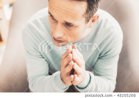 Sad grey-eyed man feeling terrible after divorce 48105208