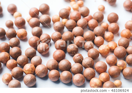 Blush balls on a light background close-up. Blush balls on a light background close-up. 48106924
