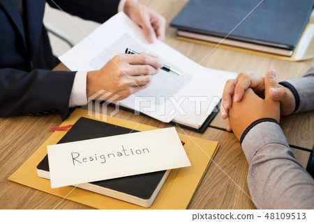 businessman hand sending a resignation letter to executive boss businessman hand sending a resignation letter to executive boss 48109513