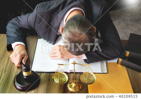 lawyer tried or stress from hard working. lawyer tried or stress from hard working. 48109515