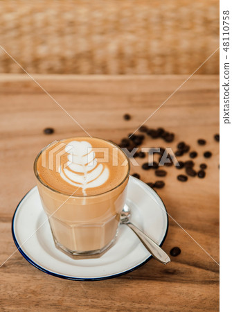 Nice cups of hot Coffee Latte on wood table Nice cups of hot Coffee Latte on wood table 48110758