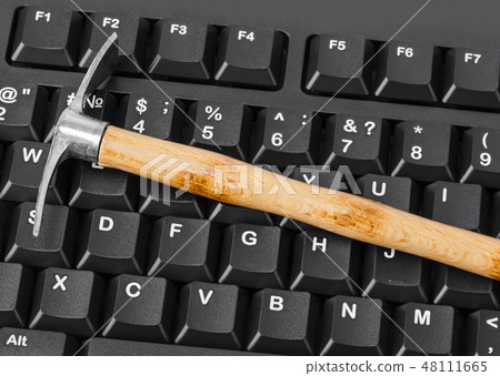 Computer and pickaxe - bitcoins mining Computer and pickaxe - bitcoins mining 48111665