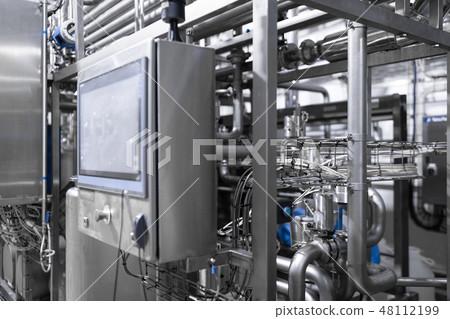 Equipment, cables and piping found inside of modern industrial power plant Equipment, cables and piping found inside of modern industrial power plant 48112199