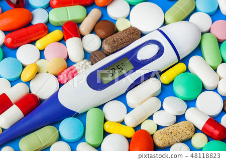 Pills and electronic thermometer (37.5 degrees) Pills and electronic thermometer (37.5 degrees) 48118823