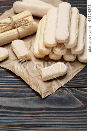 Italian Savoiardi ladyfingers Biscuits on wooden backgound with copy space 48124208