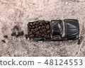 Roasted coffee beans on the model car 48124553