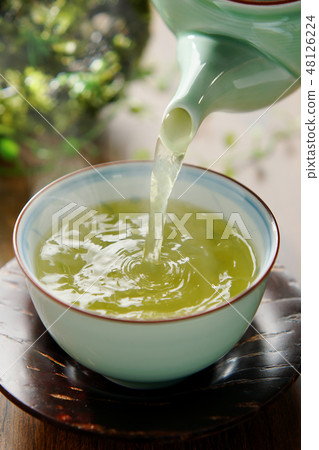 Tea to be poured Tea to be poured 48126224