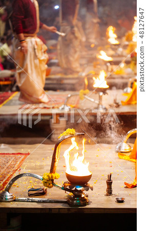 A Hindu priest performs the Ganga Aarti ritual A Hindu priest performs the Ganga Aarti ritual 48127647